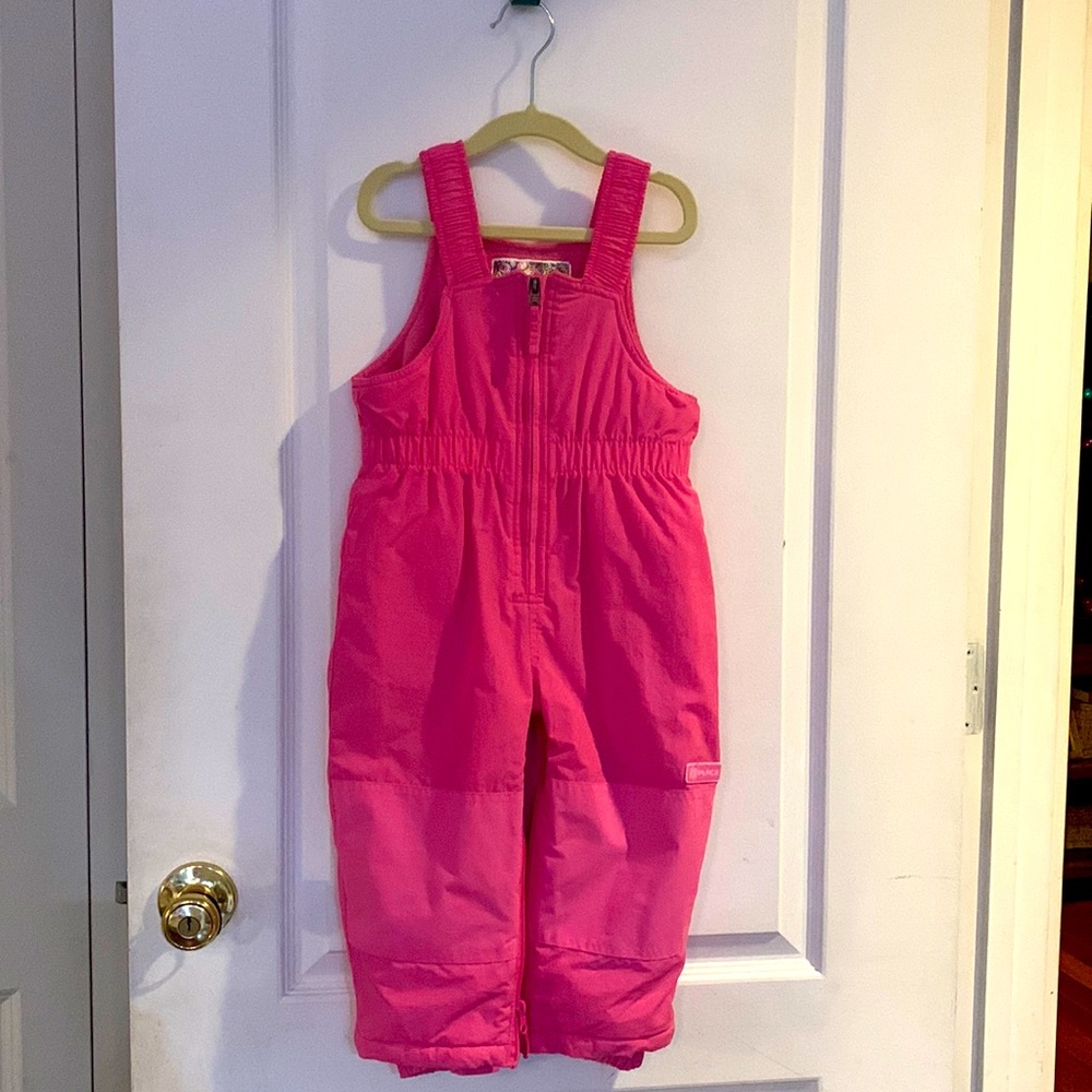 Pink snow overalls from children place